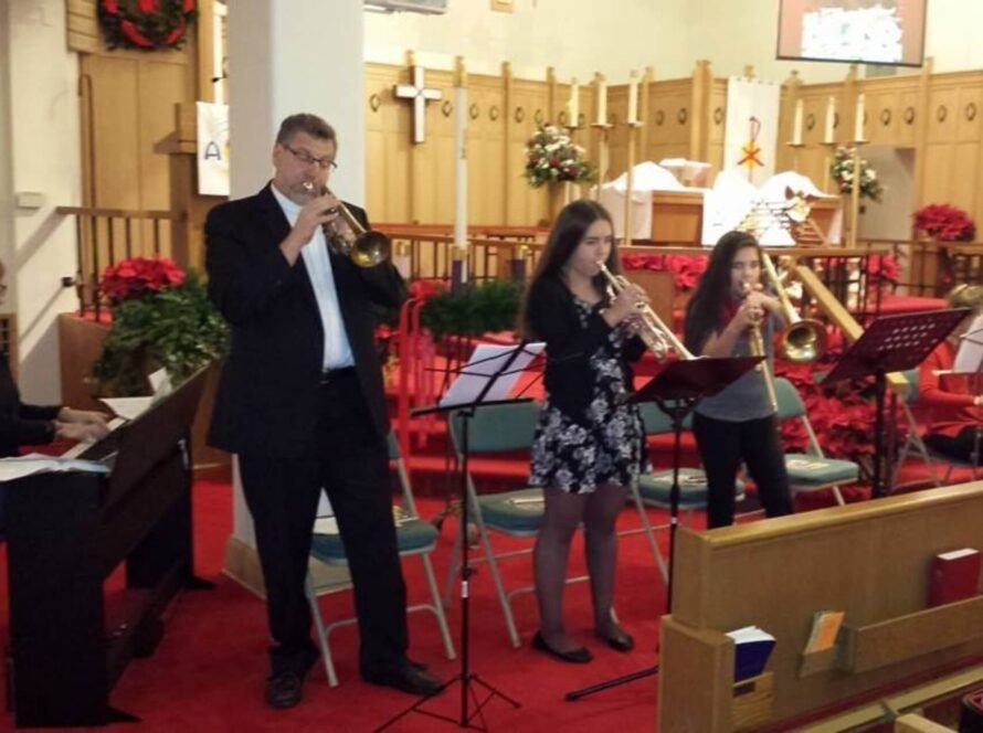 People playing instruments in church